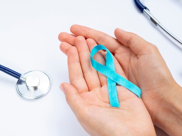 close up hands holding blue ribbon with stethoscope 23 2148283513