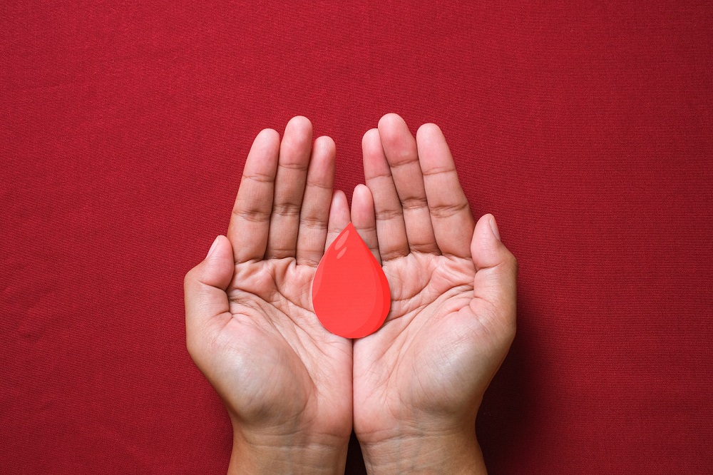 hands-holding-blood-drop-give-blood-donation-blood-transfusion-world-blood-donor-day-world-hemophilia-day-concept