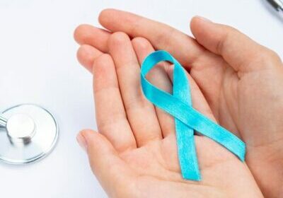 close-up-hands-holding-blue-ribbon-with-stethoscope_23-2148283513