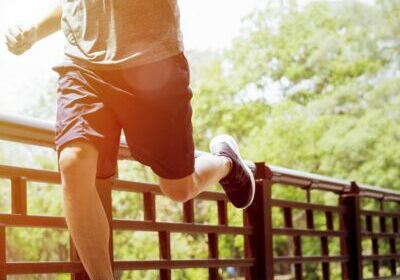 Runner man. Health and fitness outdoor concept. Man is jogging in  the morning. Young man doing sports and jogging in a park.