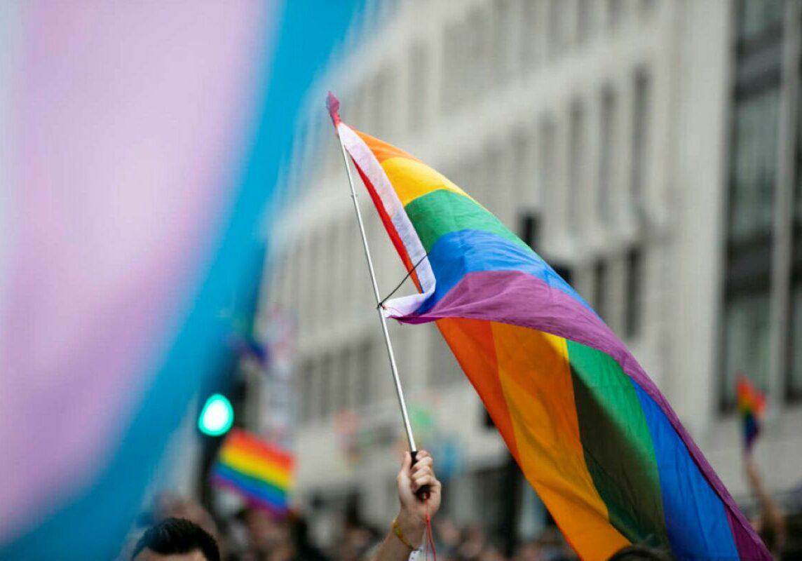 lgbtq gay-pride-lgbtq-rainbow-flags-being-waved-air-pride-event-1024x683