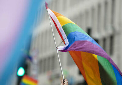 gay-pride-lgbtq-rainbow-flags-being-waved-air-pride-event
